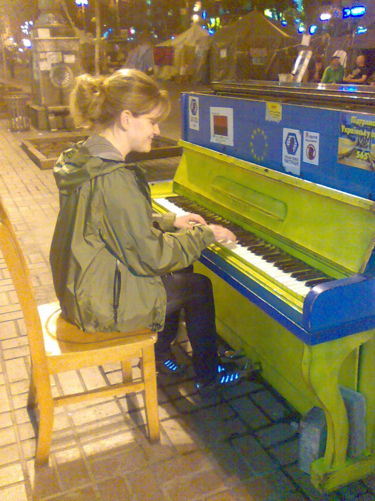 Julie, playing the famous piano in front of City Hall