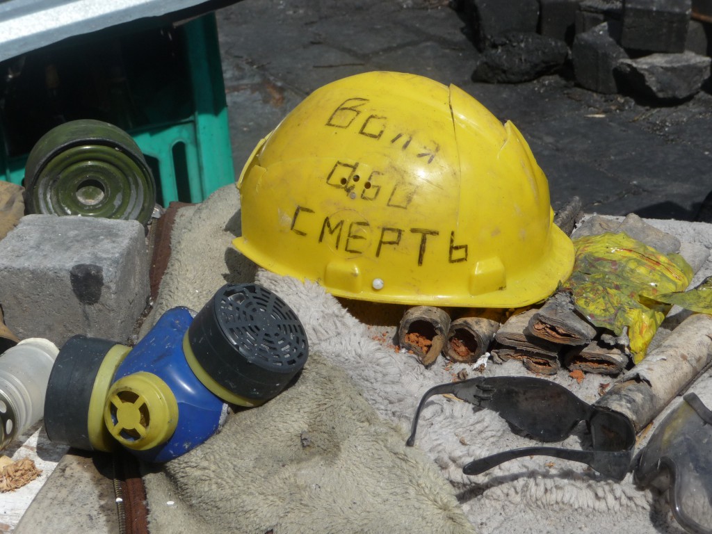 A hardhat proclaims, "Liberty or Death."