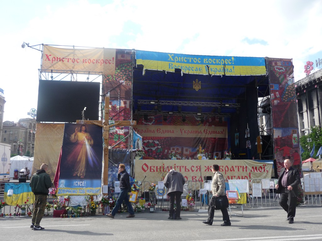 The stage in the center of Maidan: a banner proclaims, "Christ is risen!"