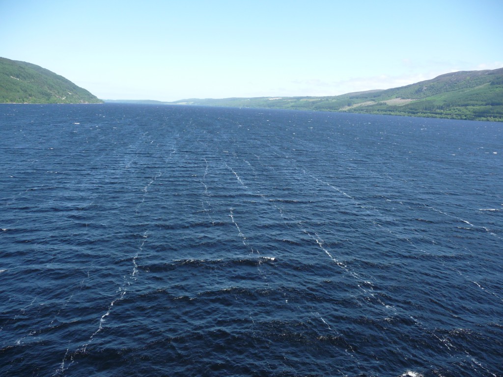 At the height of summer, the fierce wind over the loch chilled me and made me squint before its fury.