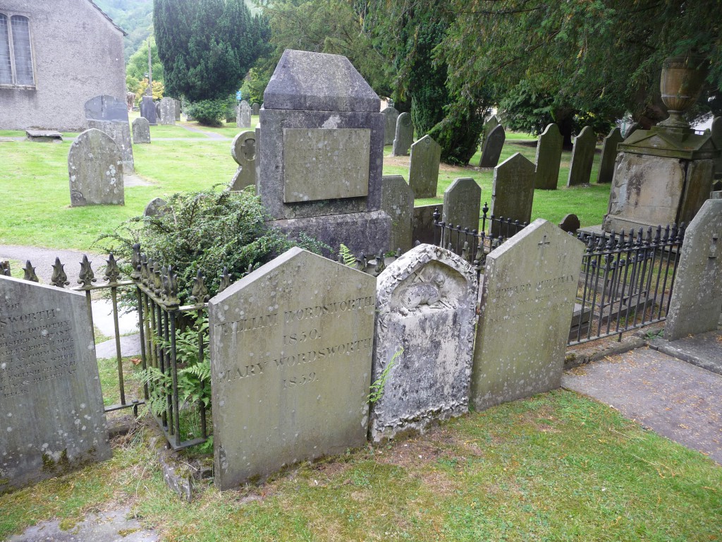 William Wordsworth rests in a quiet churchyard in the Lake District he loved, in the shade of trees he planted himself.